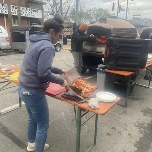 Cater table behind the oven.