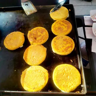 a pan of mozzarella on a grill