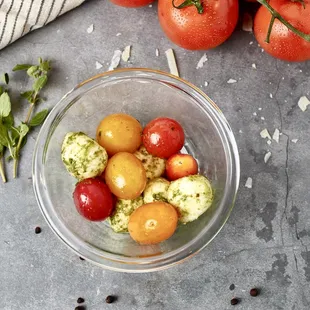 cherry  tomatoes ,home made pesto and cherry Mozz