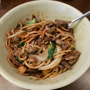 Cooked bowl with 2 full bowls of raw ingredients. Tasted delicious - there was so much flavor! But not sure if portion is worth $23