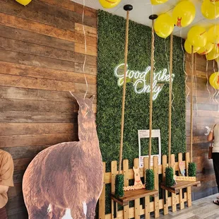 a wooden wall with a sign that says good luck day