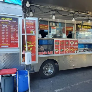 a food truck parked in a parking lot