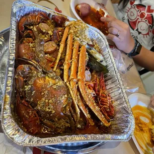 a tray of cooked crab legs