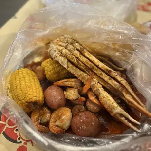 S-4  1/2 pound Snow Crab 1/2 Shrimp no head  1/2 sausage  2 corn &amp; 2 Sausage