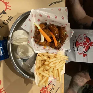 Chicken wings and fries
