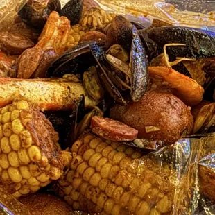 THE BASICS -  1/2 lb. Shrimp (No Head),  1/2 lb. Sausage,  1/2 lb. Blue Mussels plus King Crab Legs