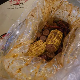 Crawfish, pork sausage, corn, potatoes