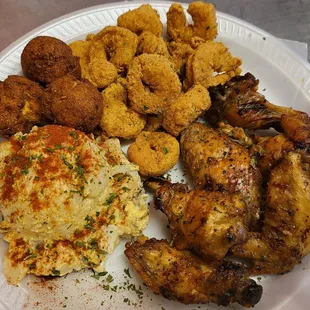 Baked chicken, potato salad, hush puppy, fried shrimp