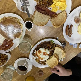 a table full of breakfast foods
