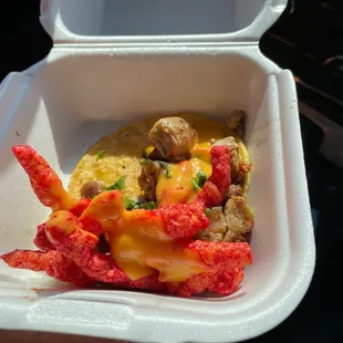 a close up of a food item in a styrofoam container