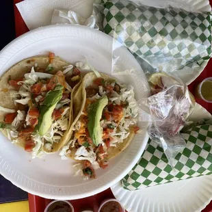 Fish tacos and burritos (el pastor and carne asada).