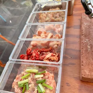 Variety of raw meat ready to be grilled