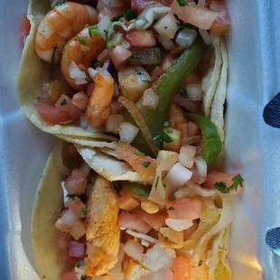 Food was okay. Not much flavor as I was expecting. Shrimp was good portioned but the fish was very lightly portioned. Overall bland.