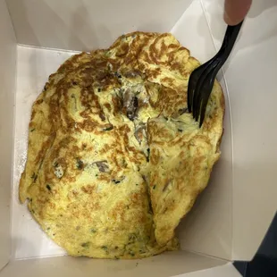 This is the amount of cheese they give you on an omelette. Stephen the head chef says they can't give more than 8 ounces.