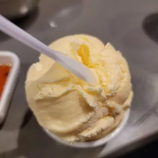 a scoop of ice cream in a bowl