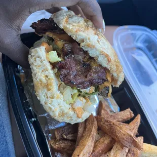 Cheese burger with beef bacon &amp; fries.
