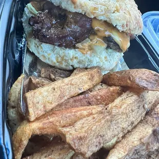 Cheese burger with beef bacon &amp; fries.