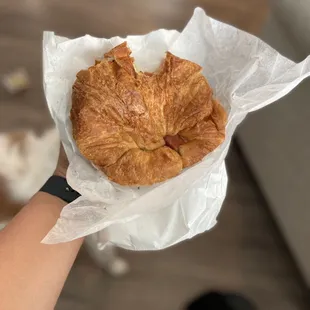 Croissant is bigger than my hand.