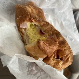 Croissant! Huge Egg, enough ham, not over powering cheese and four big strips of bacon. Stuffed croissant! Definitely Fulfilling!