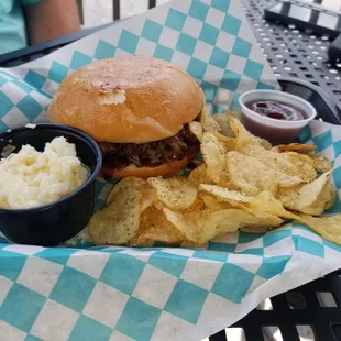 Pulled pork with pineapple slaw and parmesan chips