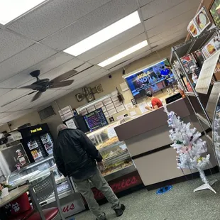 a man standing in front of the counter
