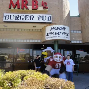 Jan, owner and Darcee, grand daughter during college football season