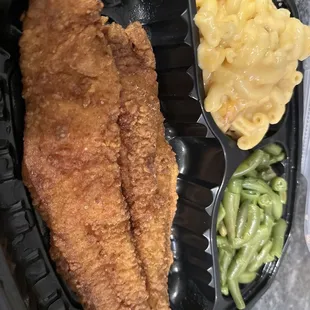 a fish fillet and macaroni and cheese