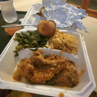 Excellent smothered pork chops with collards greens and mac&amp;cheese w/corn muffin...  $10.00 Senior special 11am-3pm mon-fri