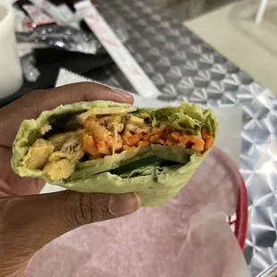 Close up of the inside of the grilled chicken wrap