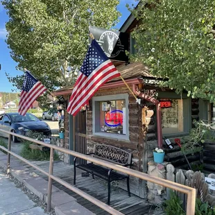 a bench and american flags