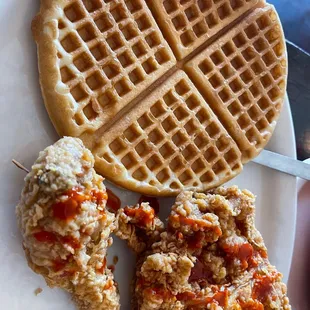 a plate of fried chicken and waffles