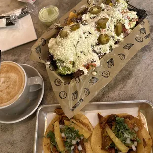 Tacos al pastor and meat nachos! My Mexican choice