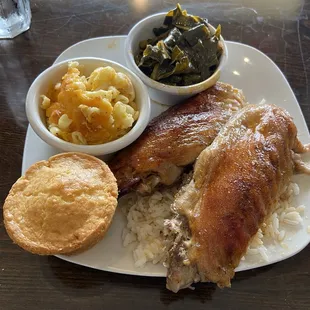 Turkey wings w/rice and gravy, collards, macaroni and cheese and cornbread.