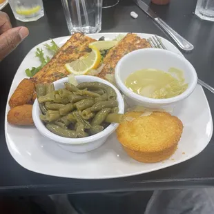 2-piece Grilled Salmon, with a side of cabbage and green beans.