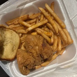 Chicken wing sandwich and fries