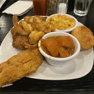 The All American (fried chicken, fried shrimp, friend fish) and Mac and cheese, yams, cornbread