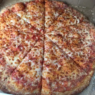 Pizza, the second time we ordered. Thinnest layer of cheese and barely there sauce. This is more adequately &quot;breadsticks&quot; than pizza.