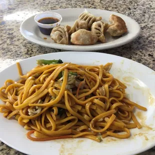Vegetable lo mein and fried pork dumplings