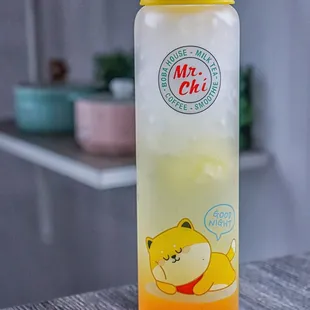 a bottle of tea on a table