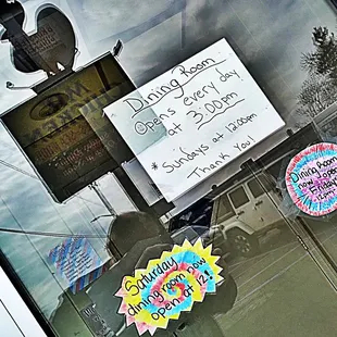 a sign in the window of a restaurant
