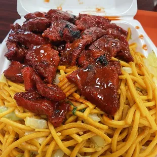 chicken and noodles in a styrofoam container