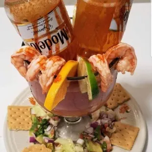 a shrimp cocktail with crackers