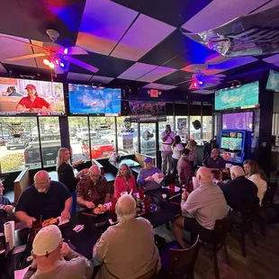  large group of people sitting at a table