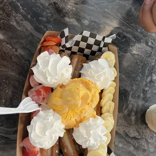 Supreme churros with vanilla ice cream