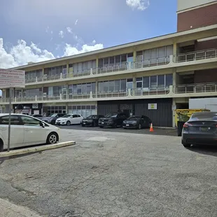 a parking lot in front of a building