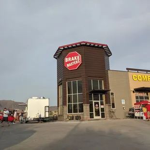 a stop sign in front of a store