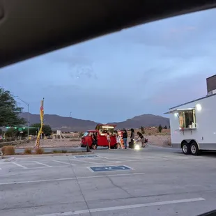 a food truck parked in a parking lot