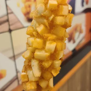 Fried potatoes with 1/2 mozzarella, 1/2 sausage