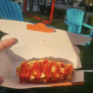 Fried Potato Corn Dog with Cheddar and Mozzarella on the inside.