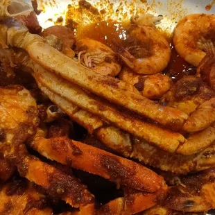 Snow crab, shrimp, corn, potatoes, and boiled eggs